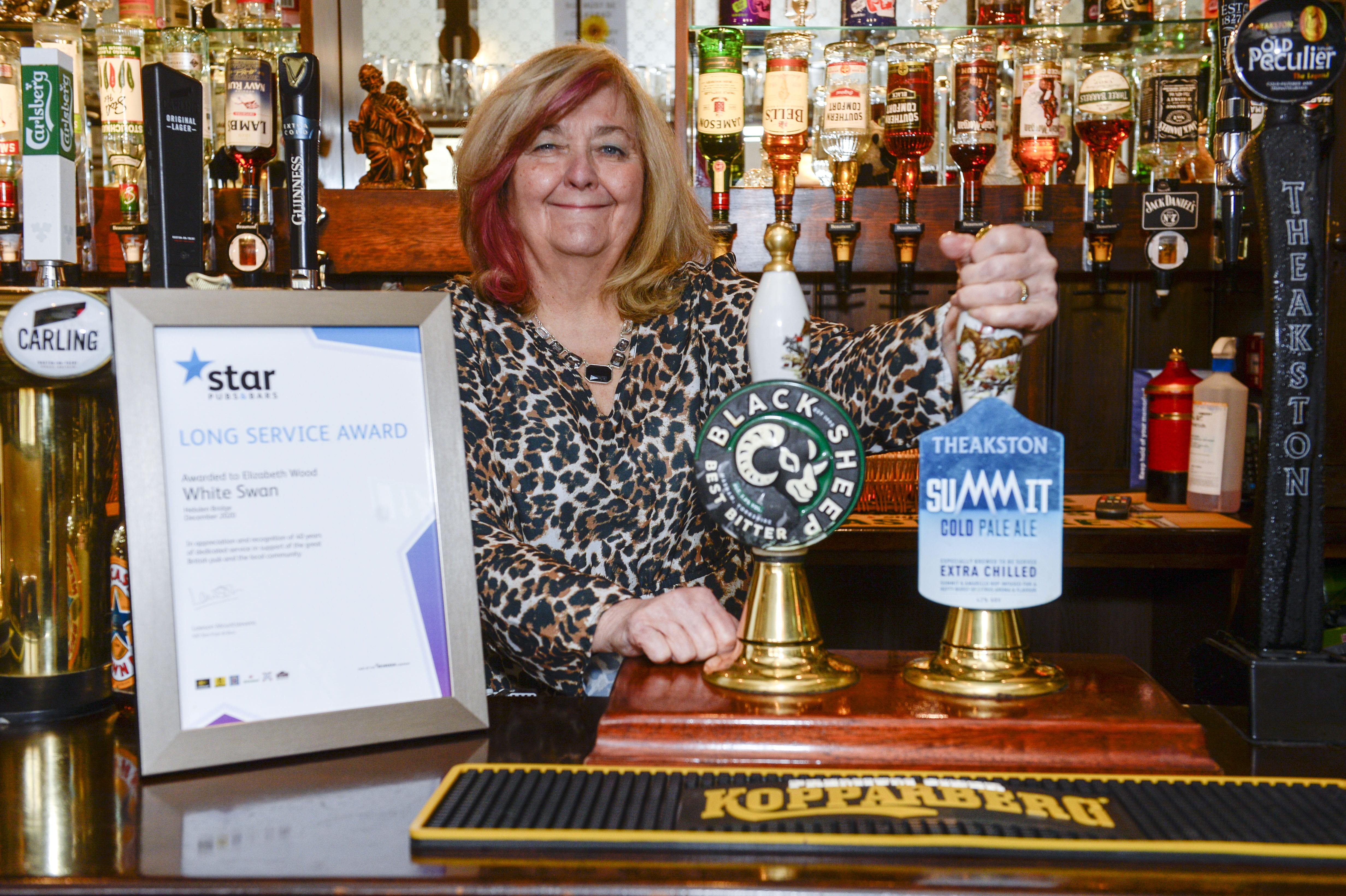 Hebden Bridge's Longest-Serving Licensee Celebrates Prestigious Award and Pub's Reopening